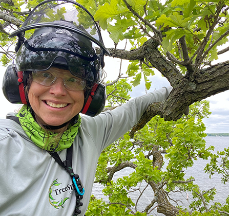 image of Rebecca Seibel in a tree